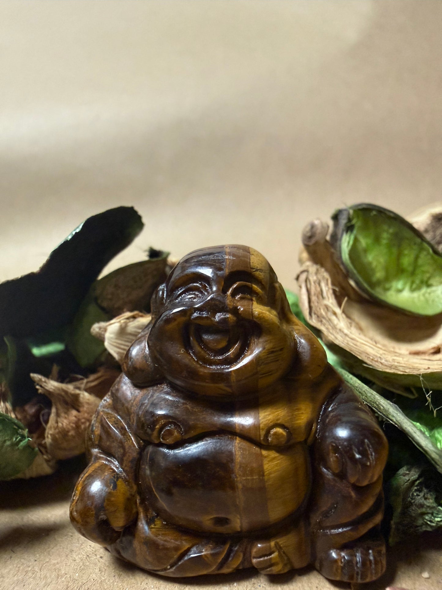 Carved Tigers Eye Buddha